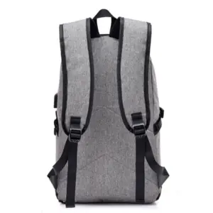 Person wearing the backpack, demonstrating its fit and style