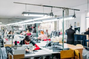Our specialist carefully sewing a custom bag