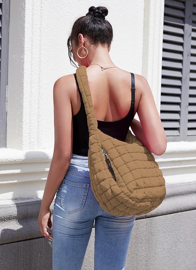 Side view of the stylish puffed tote bag showing its structure and handle detail