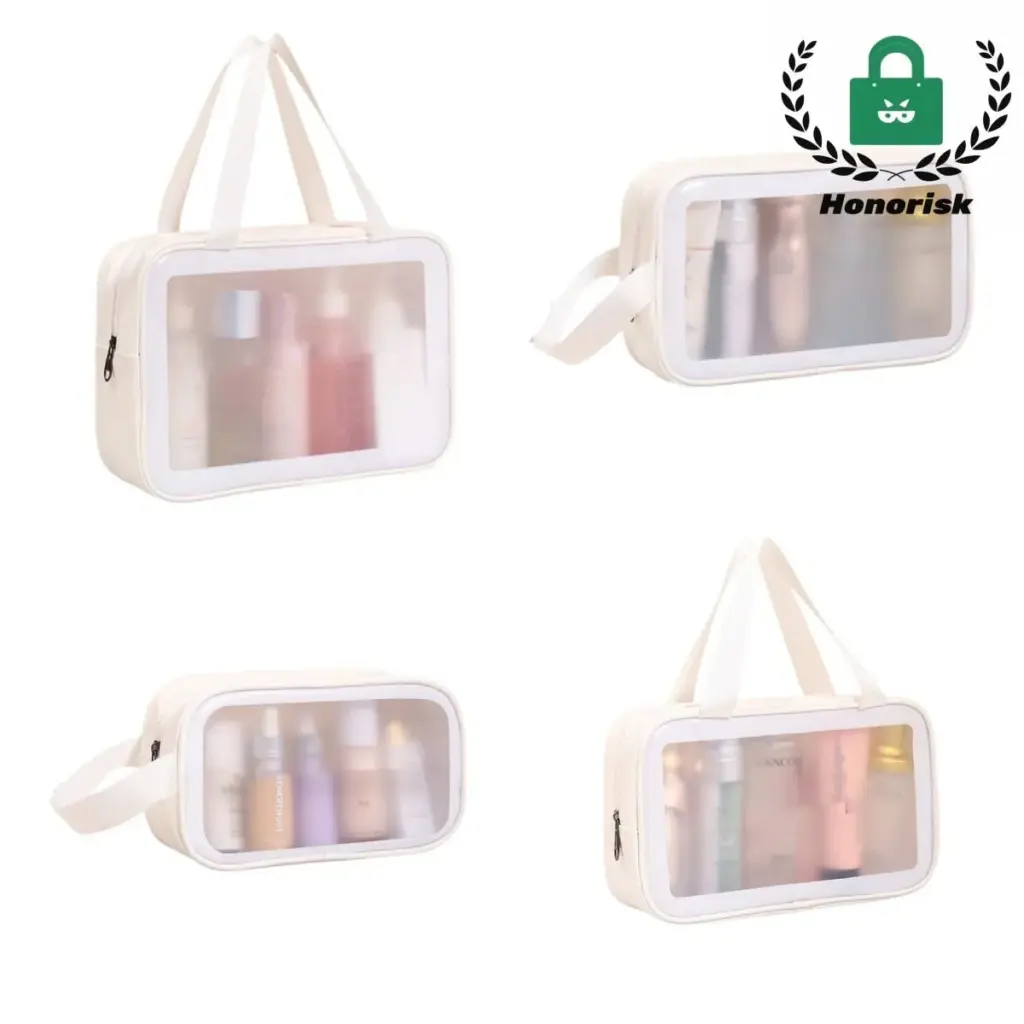 White transparent toiletry bag standing upright, showcasing its structure and clear panels.