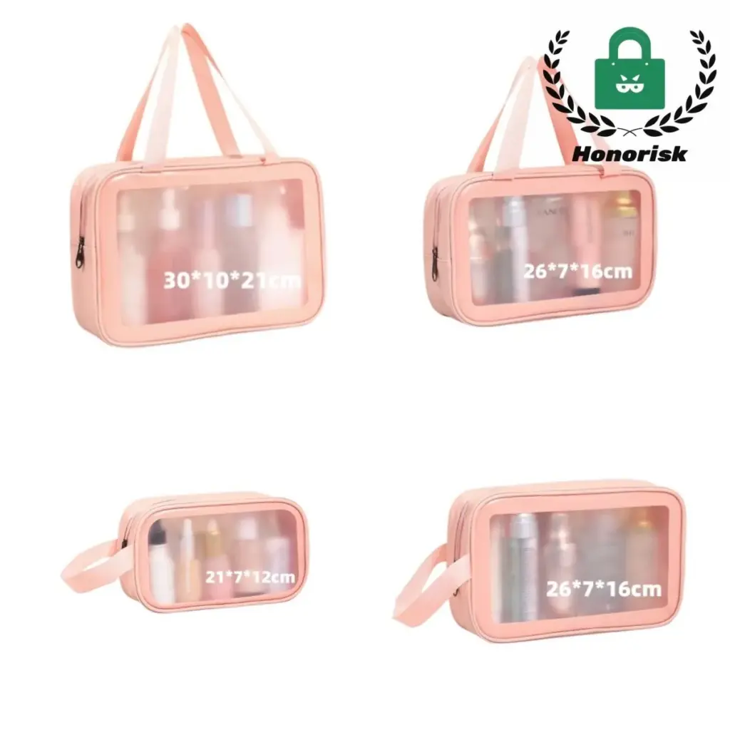 Pink transparent toiletry bag lying open, showing organized travel bottles and a toothbrush inside.
