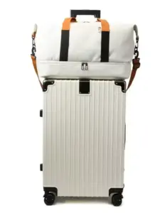 Side profile of the bag highlighting its structure and adjustable strap
