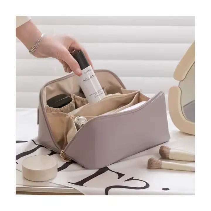 Open view of the makeup bag showing the organized interior compartments