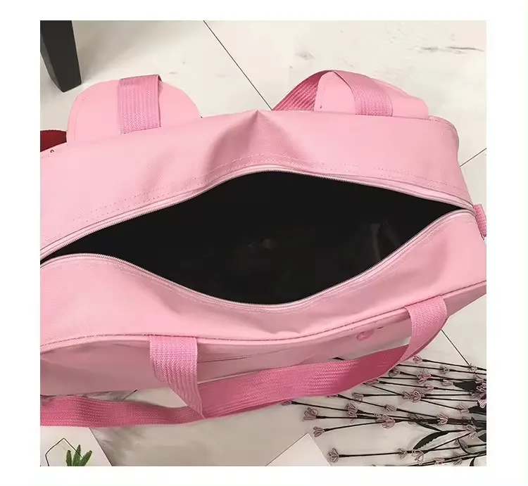 Cute cat-themed travel bag being carried by a woman