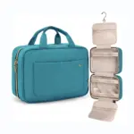 Iragazgaitza Komuneko makillajea poltsa poliki-poliki heldulekuekin, itxita eta guztiz irekita agertzen dira kremaileratutako konpartimentu ugari bistaratzeko; OEM / ODM pertsonalizaziorako erabilgarri.