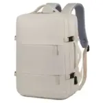 A mochila portátil para viaxes de negocios impermeable con carga USB ten un deseño de crema minimalista, Dous petos dianteiros, correas acolchadas axustables, e está dispoñible para a personalización OEM/ODM.