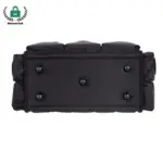 Vista inferior de la bossa de múltiples eines de gran capacitat en negre, amb sis peus rodons i costures cosides, es mostra en un fons blanc.